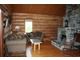 Log and stone home with 2 furnished cabins on ri