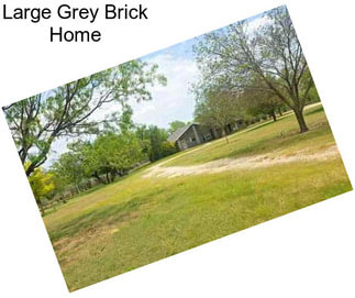 Large Grey Brick Home