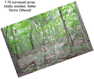 7.70 surveyed acres totally wooded. Seller Terms Offered!