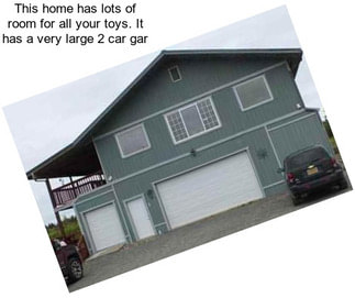 This home has lots of room for all your toys. It has a very large 2 car gar